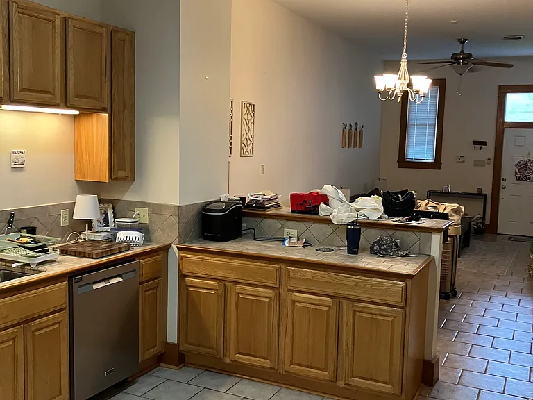 Kitchen has lots of cabinets