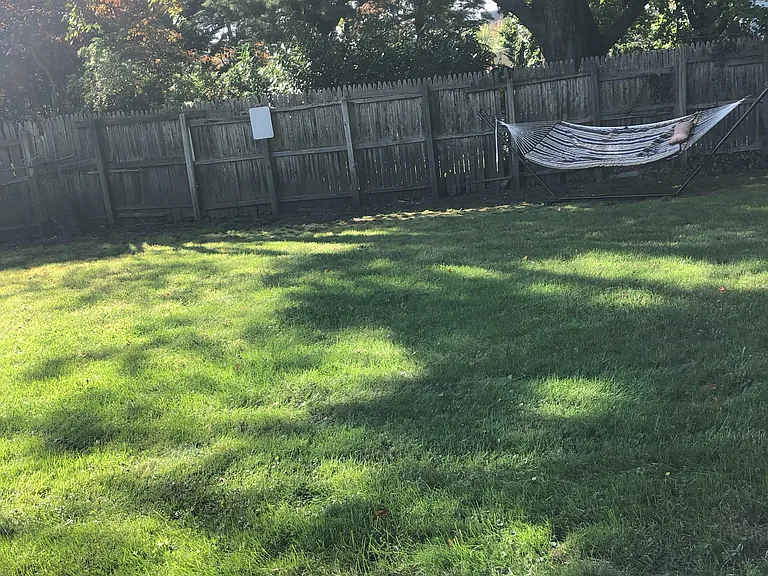 Hammock in the private backyard with private parking lots and assigned parking space