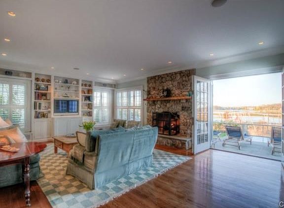 Riverstone fireplace and french doors for indoor-outdoor enterta