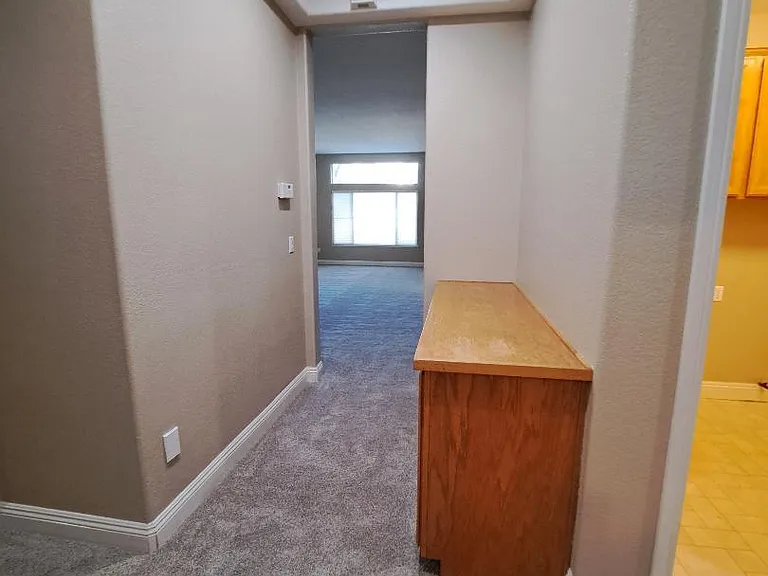 Hall cabinetry perfect for linen storage