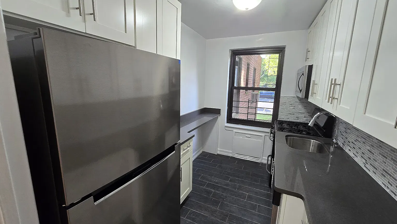 212-03 75th Avenue — Photo 3