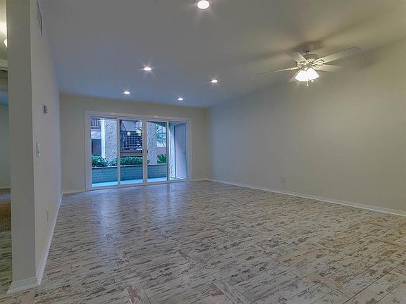Big bright floorplan, custom flooring and lots of natural light and installed lighting (and blinds)