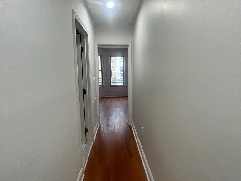 Hall from kitchen and living room to bathroom and front room.
bedrooms are spread apart for privacy.
