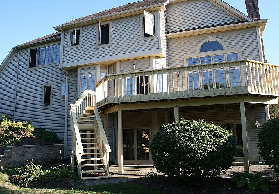 deck off of the kichen, below is a cover patio off of familyroom
