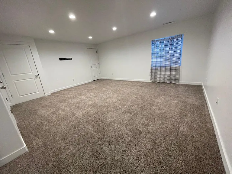 Large Bedroom #4 (Downstairs); or Large Family Room or Den