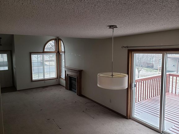 Living room, dining area, and deck