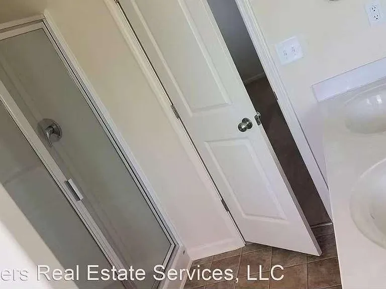 Master bath with double sink, Full Bath tub and separate Shower.