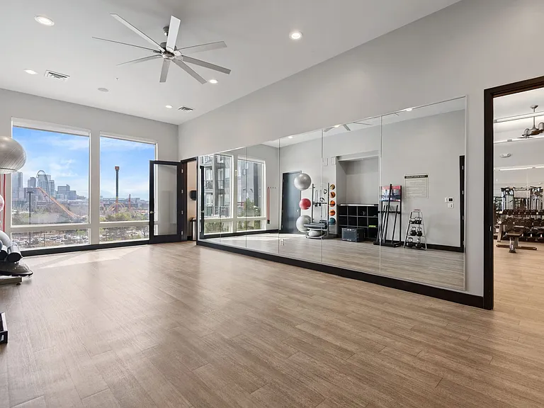 A serene, light-filled yoga room designed for balance, movement, and mindful moments