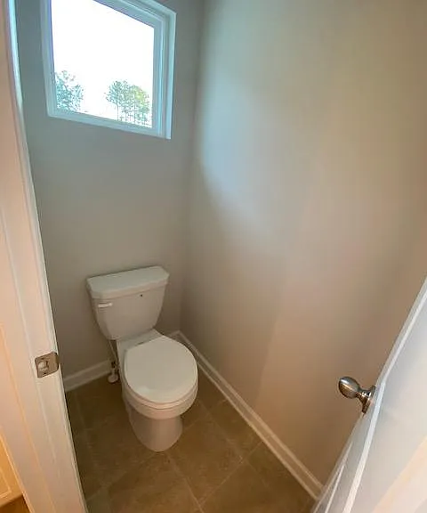 Master toilet separate room off the master bath