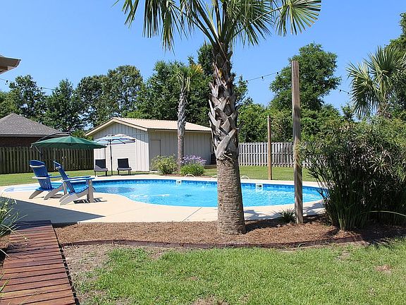 Salt Water Pool and Garage 