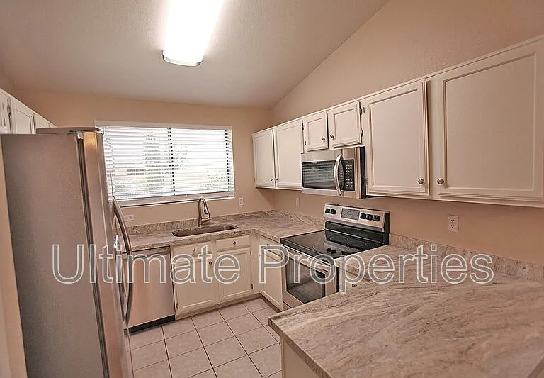 1225 E Harvard Ave — Photo 6