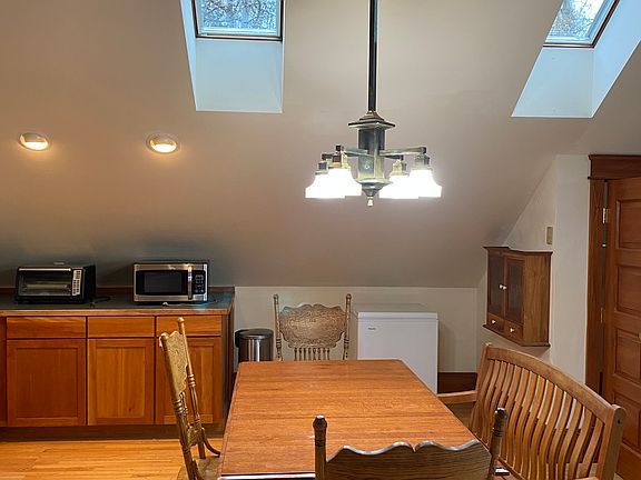 Large dining table, lots of cabinet space and a small chest freezer