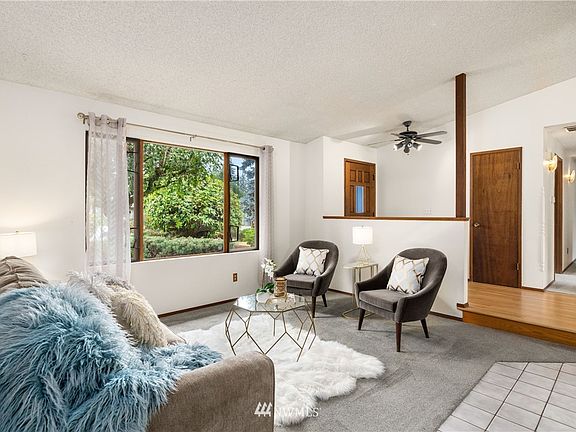 Delightful entry with custom hardwood floors to greet your guests.