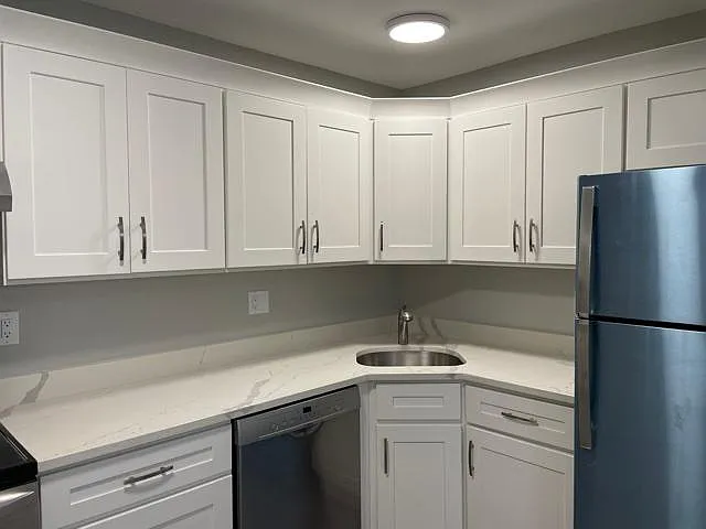 Kitchen Sink Area and Cabinetry