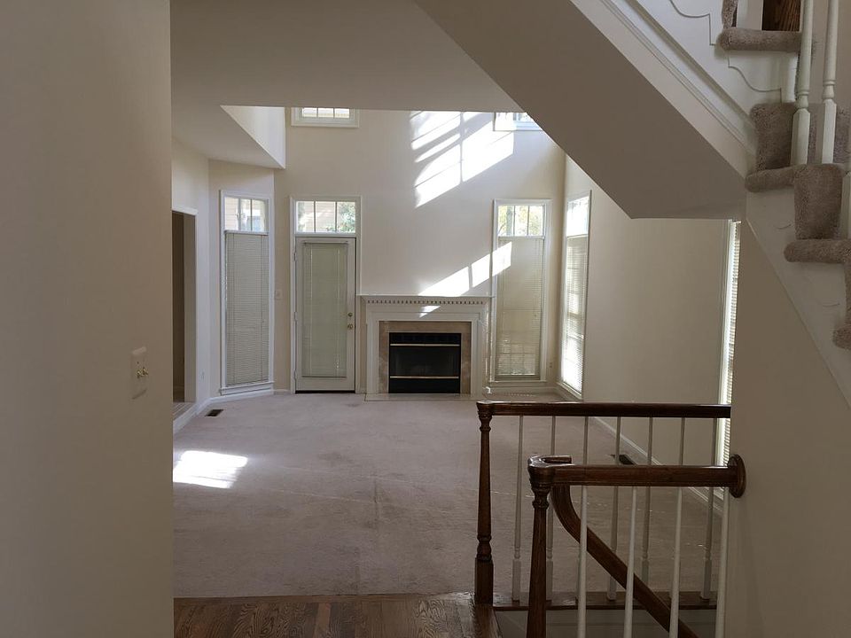 2-story living room with wood burning FP