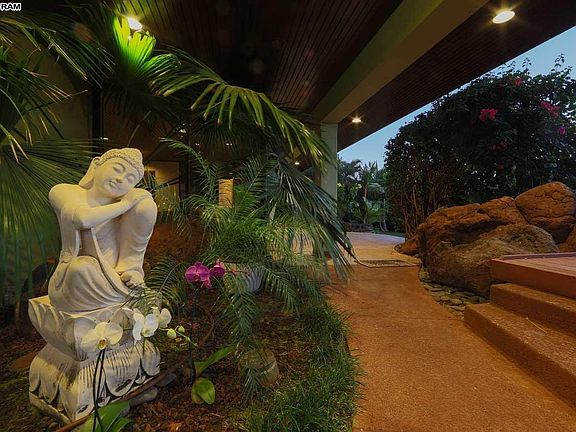 Entrance to the Front of House, 
near the Jacuzzi, Swimming Pool, 
 and BBQ Patio Area with Table for 6 people.