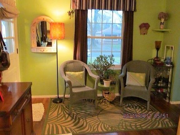 Dining room is now painted A neutral color.