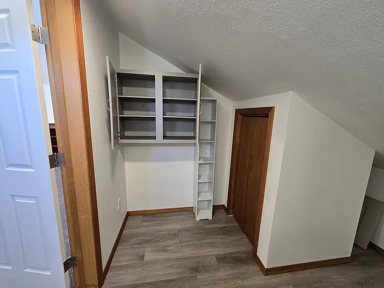 Upstairs half bath with cedar closet storage