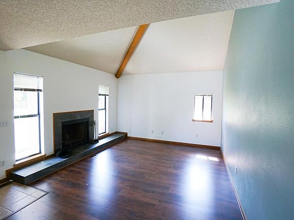 Cosy fireplace and hearth.