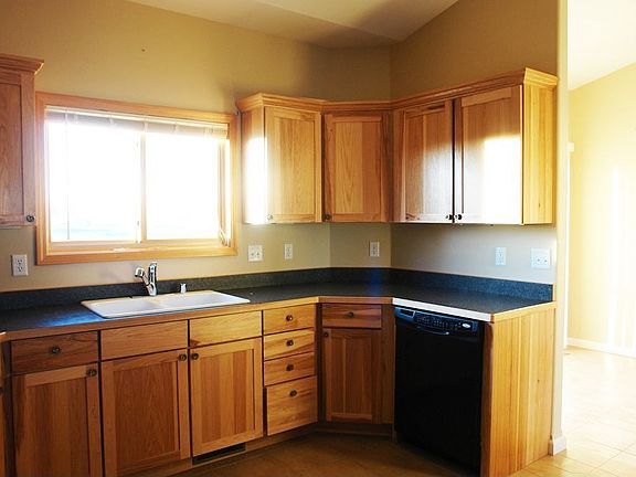 Hickory Cabinets w/tile flooring