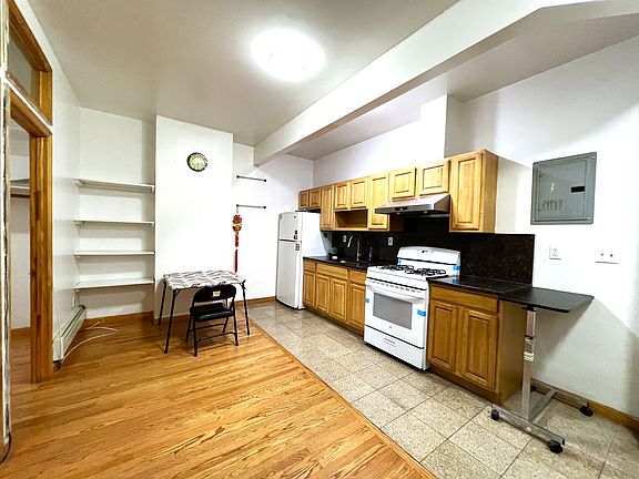 5th image of 213 E Broadway APT 2