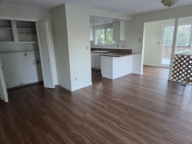 Upstairs laundry hookups on closet. Kitchen.