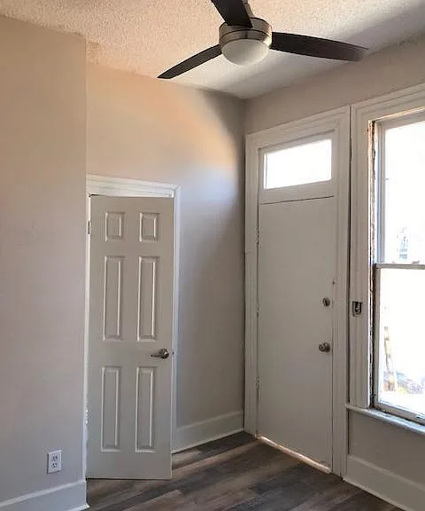Bedroom 2 with door directly into bath and backyard