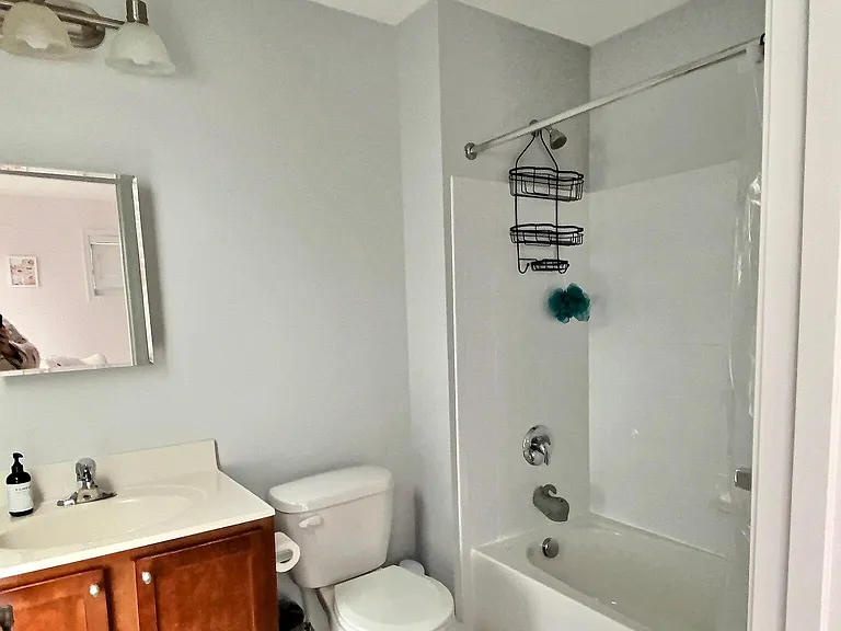 Full bath in bedroom #2 with combo shower/tub