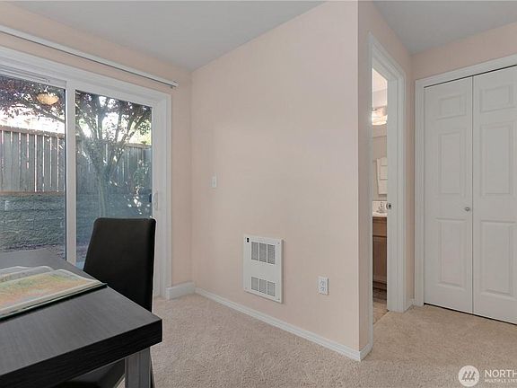 Closet + 3/4 bathroom and sliding door to the yard.