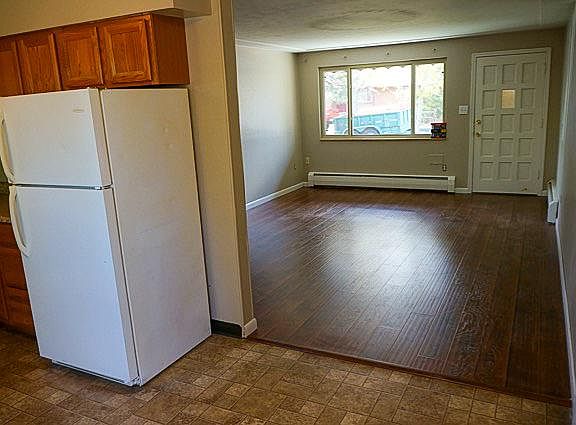 View from dining nook towards living room and front door.