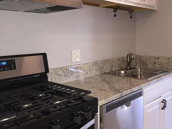 Totally updated Kitchen with Granite countertops and stainle