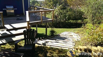 View around side of house from back fire pit