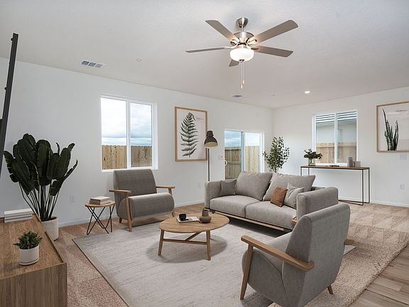 The family room is off of the kitchen and dining room.