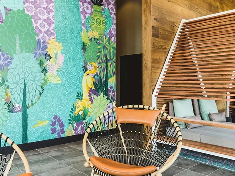 Relax in artful seating in the outdoor lounge area