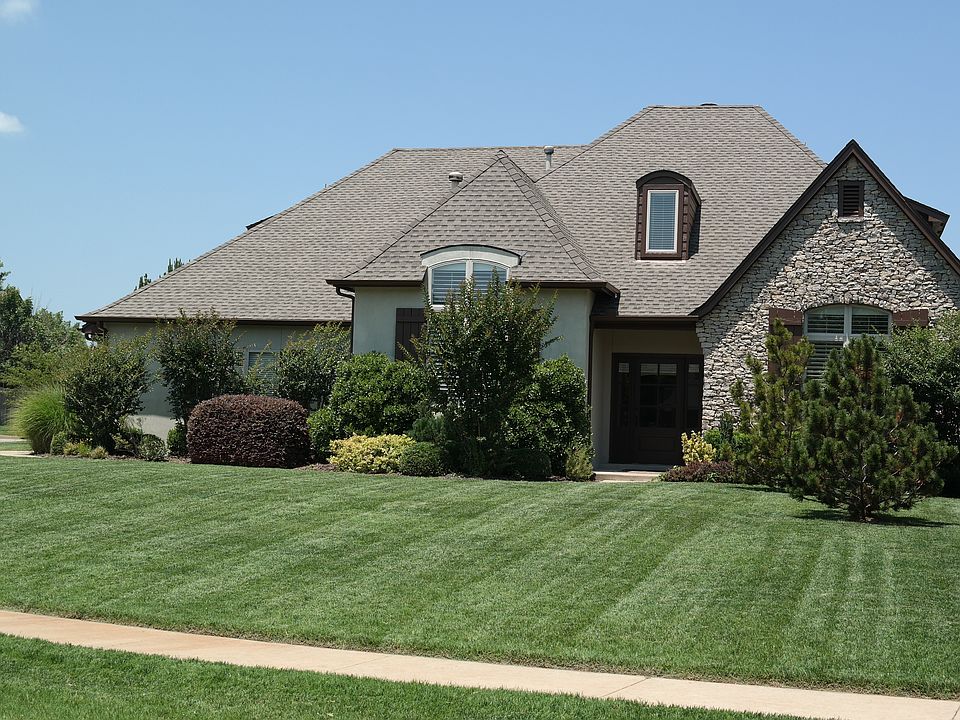 Mature landscaping and lawn