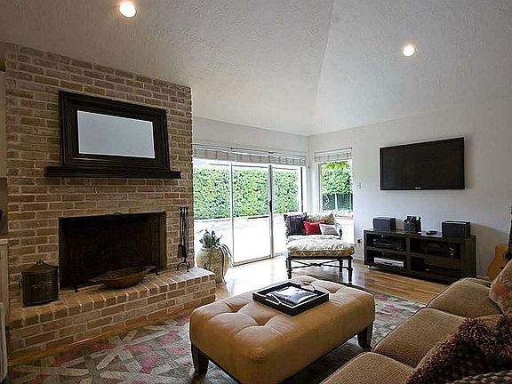 Family room with high ceilings and fireplace