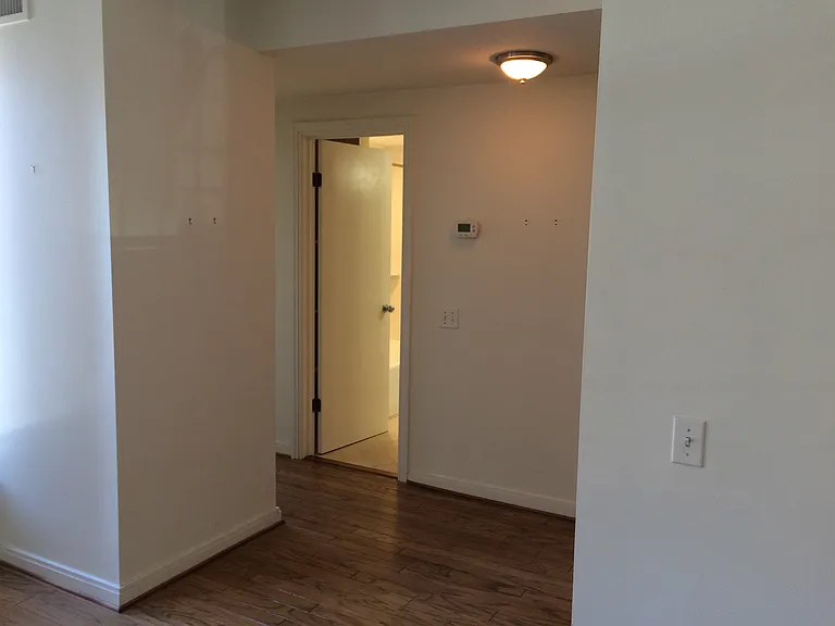 Living room facing bathroom.