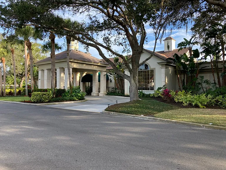 Clubhouse with dining and large bar, golf shop, tennis shop and next to fitness center.