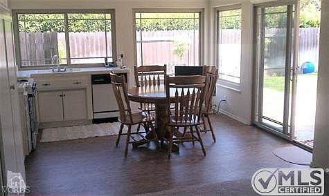 New dual glazed windows and patio door give a wonderful view of the backyard and patio. There is a cathedral ceiling that enhances the openness of the home.