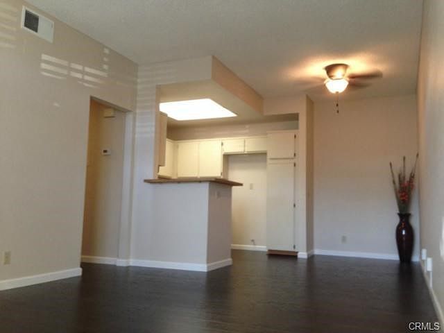 Open floor plan with new laminate flooring