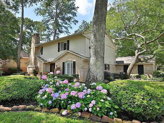 Hambleton House sits under a vista of tall trees. Houston is much more enjoyable when you have mature trees shading you.