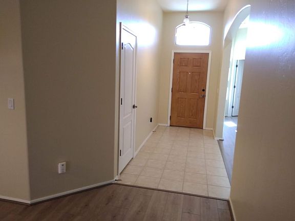Front entry and adjacent living room entry.