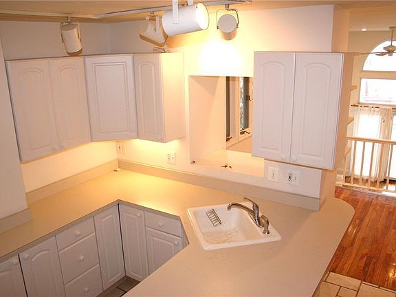 Looking down into kitchen from stairs