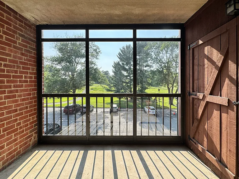 Spacious enclosed balcony with scenery view