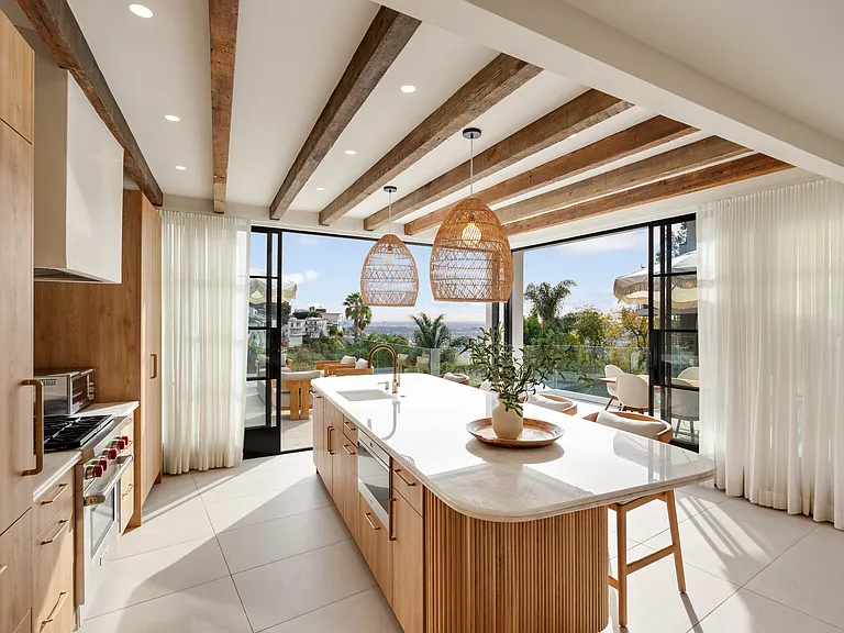 The heart of the home, blending modern design with hillside views.