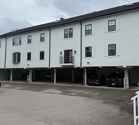 Rear of building - note 2 car tandem parking