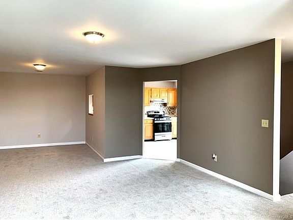 View of dining area and kitchen