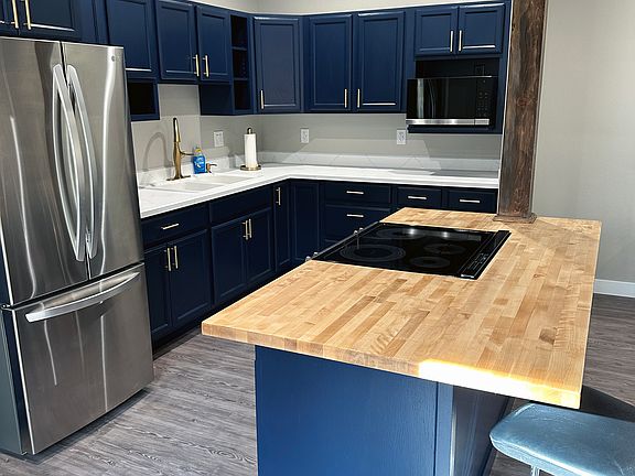Kitchen with new island & range