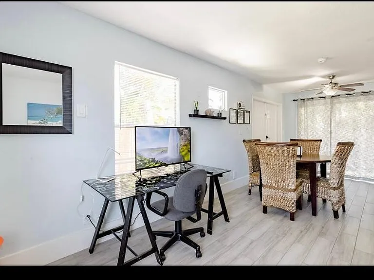 834 NE 18th Ct — Photo 1