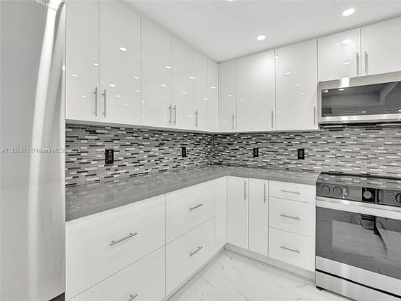 4th image of 9801 Collins 15x Ave